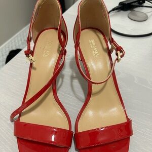 Women’s Michael Kors size 9 red heel, in great condition.